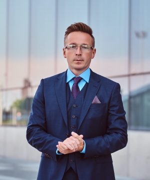confident-businessman-dressed-in-an-elegant-suit-s-2021-08-28-00-59-34-utc.jpg confident-businessman-dressed-in-an-elegant-suit-s-2021-08-28-00-59-34-utc.jpg